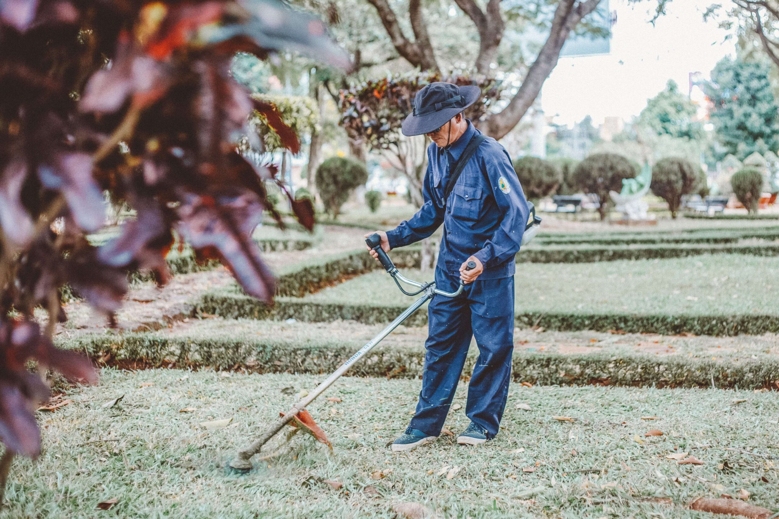 Man using weed whacker