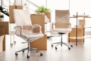 Trusted Commercial Movers Near Me for Seamless Office Moves Across the UK - Chairs and Boxes